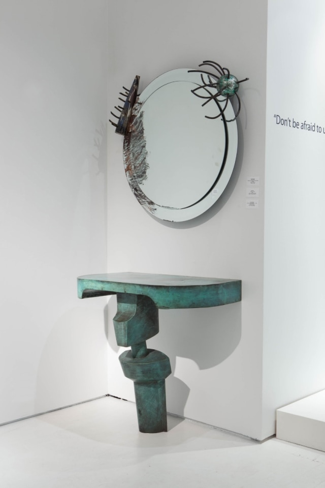 Art et Industrie exhibition installation view: Carmen Spera's mirror (1985) and Jim Cole's console (c. 1944)