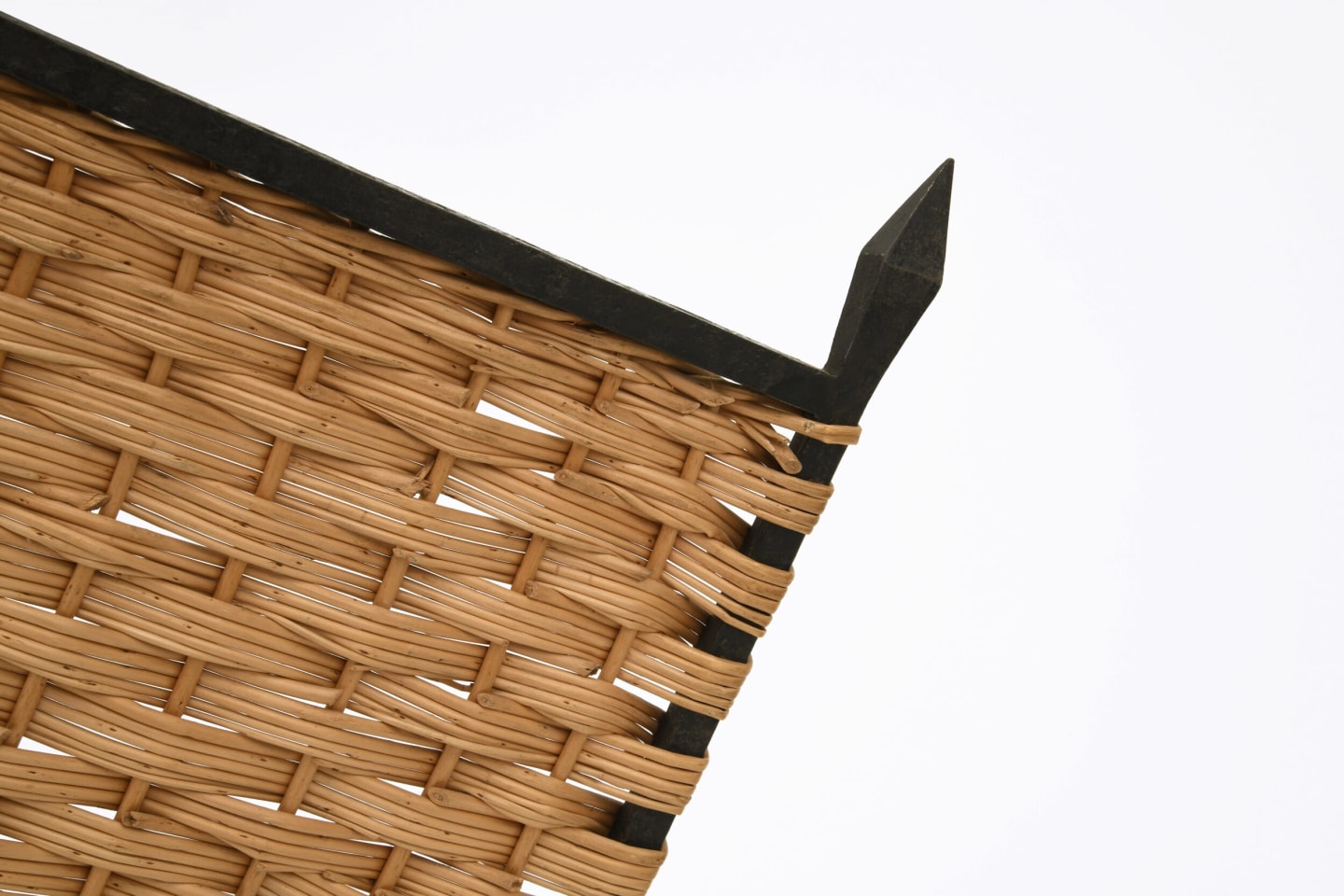 Marolles' chair detailed view of wicker and metal frame