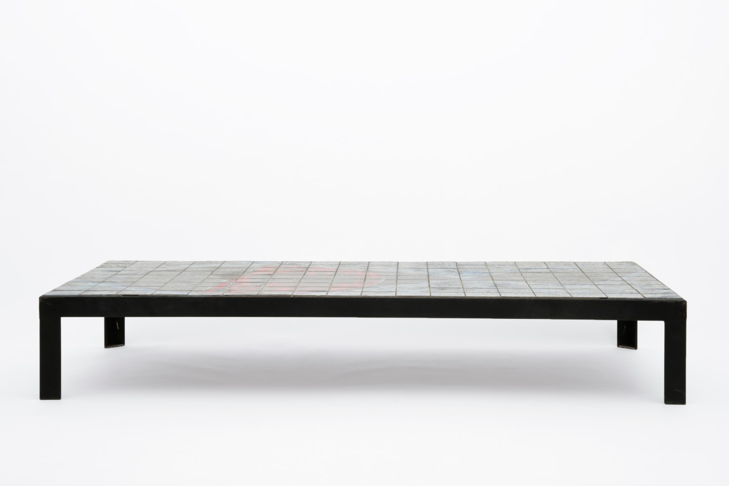 Baty's ceramic coffee table, full straight view from eye-level