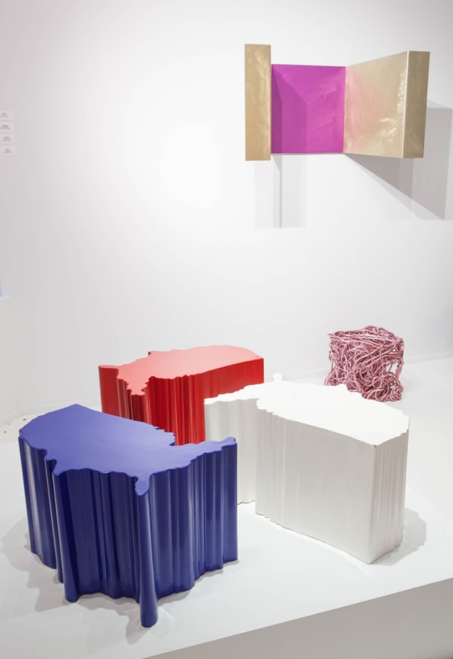 Art et Industrie exhibition installation view: Pieces from left to right are Dan Friedman's USA tables, Forrest Myers' Pink Tuffitt and Forrest Myer's Altar