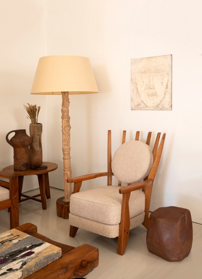Installation view of exhibition. Pieces from left to right are Ren&eacute; Gabriel side table, La Borne ceramic pitcher, Yves Mohy's ceramic vase, Pierre Blanc's floor lamp, Guillerme et Chamrbon's pair of &quot;Tapisserie&quot; armchairs, Annie Fourmanoir's stool, and Aline Gagnaire painting