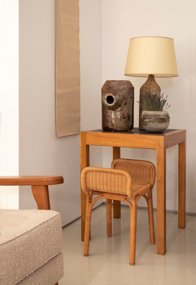 Installation view of exhibition. Pieces from left to right Ilina Horning's tapestry, Henry Jacques Le M&ecirc;me's side table, Yves Mohy's ceramic vase, Marius Bessone's ceramic bowl, La Borne's ceramic table lamp, and Louis Sognot's footrest/stool
