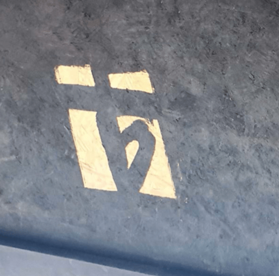 Andr&eacute; Borderie ceramic coffee table view of signature under the table