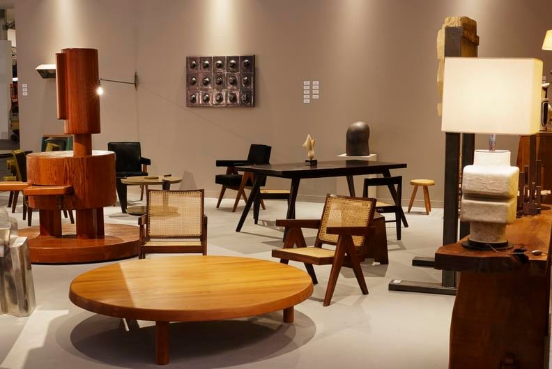 Magen H Gallery's booth at Design Miami, installation view showing Pierre Sz&eacute;kely's bar, Pierre Chapo's &quot;T02P&quot; coffee table, Pierre Jeanneret's pair of easy armchairs