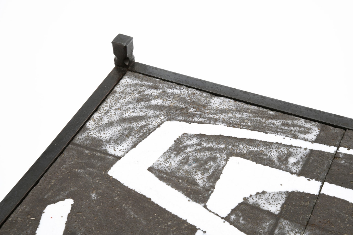 Robert and Jean Cloutier's ceramic coffee table detailed view of metal frame and ceramic top