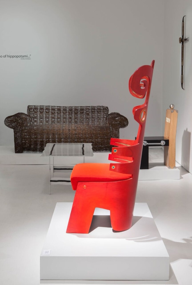 Art et Industrie exhibition installation view: Pieces from left to right are Forrest Myers' wire couch, Terence Main's &quot;Red Twiddler&quot; chair, and Dan Friedman's Truth chair