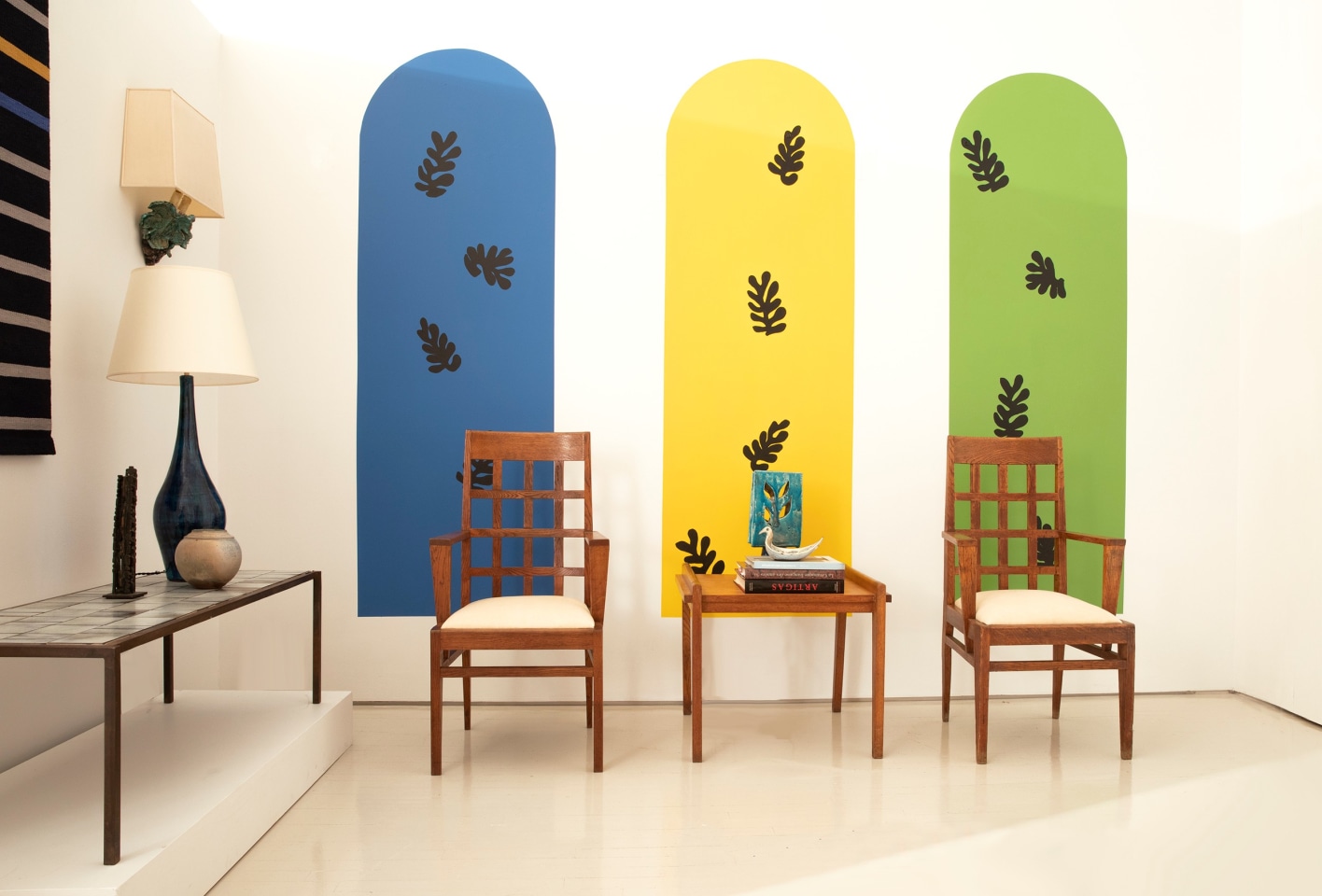 Installation view of exhibition. Pieces from left to right are Ilina Horning's tapestry, Mado Jolain's ceramic coffee table, Francois Stahly's sculpture, Robert &amp; Jean Cloutier's table lamp, Gustave Tiffoche's ceramic vase, Alice Colonieu's sconce, Ren&eacute; Gabriels pair of armchairs and side table, Vallauris's table lamp, Jeanine Malarmey's ceramic bowl