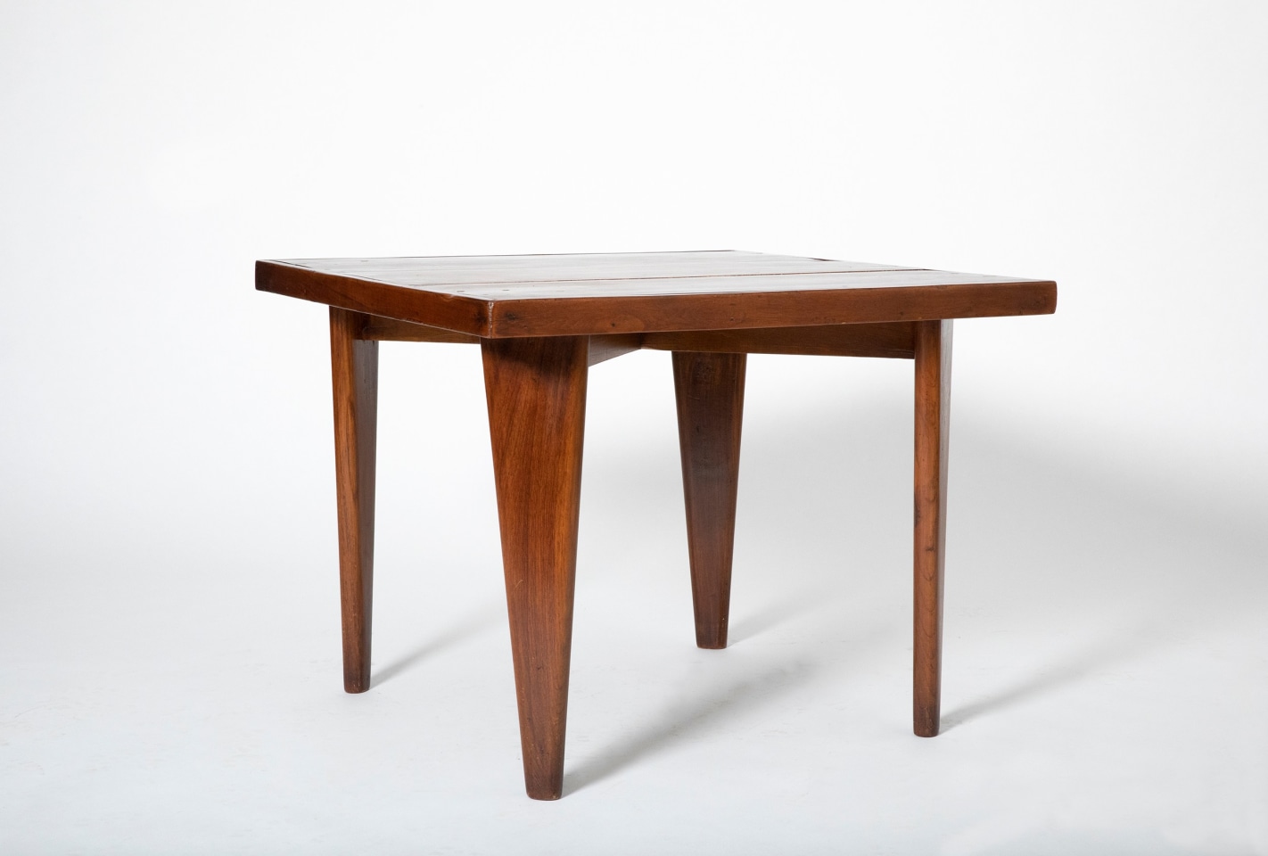 Pierre Jeanneret's square table, full diagonal view from eye-level