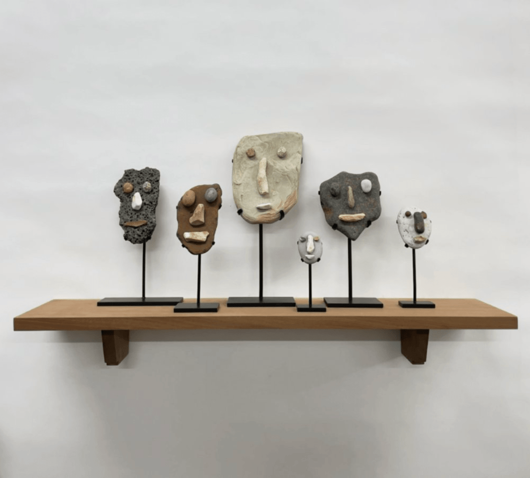 Peter Liversidge Effigy Group X (Aberdeenshire, California, Iceland, Norfolk), 2022 found stones, archival glue, welded brass, acrylic, un-waxed sapele wood shelf: 5 1/2 x 39 3/8 x 8 7/16 inches (14 x 100 x 21.5 cm) (PLi-263)