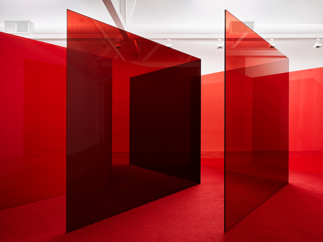 Larry Bell Pacific Red II, 2017 12 panels laminated glass Overall dimensions variable with installation