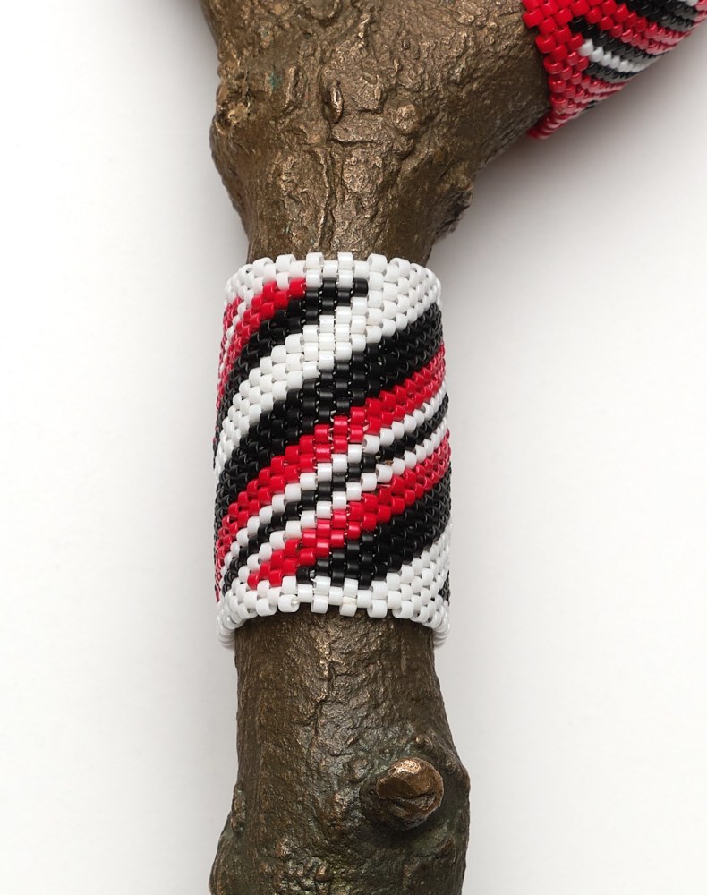 Saif Azzuz To be present, 2022 Glass beads on bronze 8 1/2 x 2 3/4 x 1 1/2 inches 21.6 x 7 x 3.8 cm