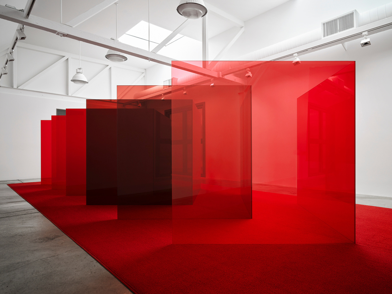 Larry Bell Pacific Red II, 2017 12 panels laminated glass Overall dimensions variable with installation
