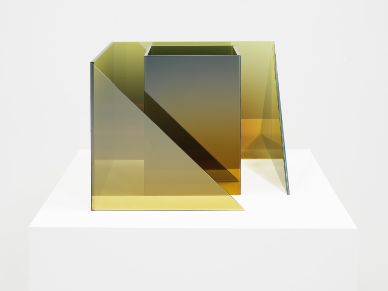 Larry Bell Deconstructed Cube SS with Triangle (Lemoncello / Emerald), 2020 Laminated glass, stainless steel and titanium dioxide 12 x 16 x 16 inches 30.5 x 40.6 x 40.6 cm