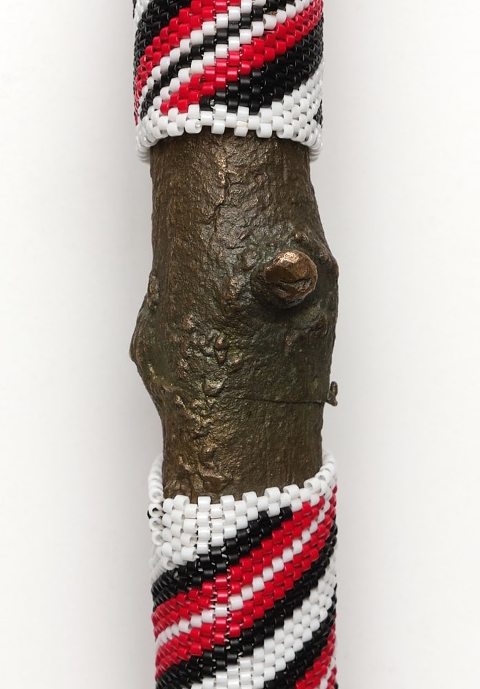 Saif Azzuz To be present, 2022 Glass beads on bronze 8 1/2 x 2 3/4 x 1 1/2 inches 21.6 x 7 x 3.8 cm