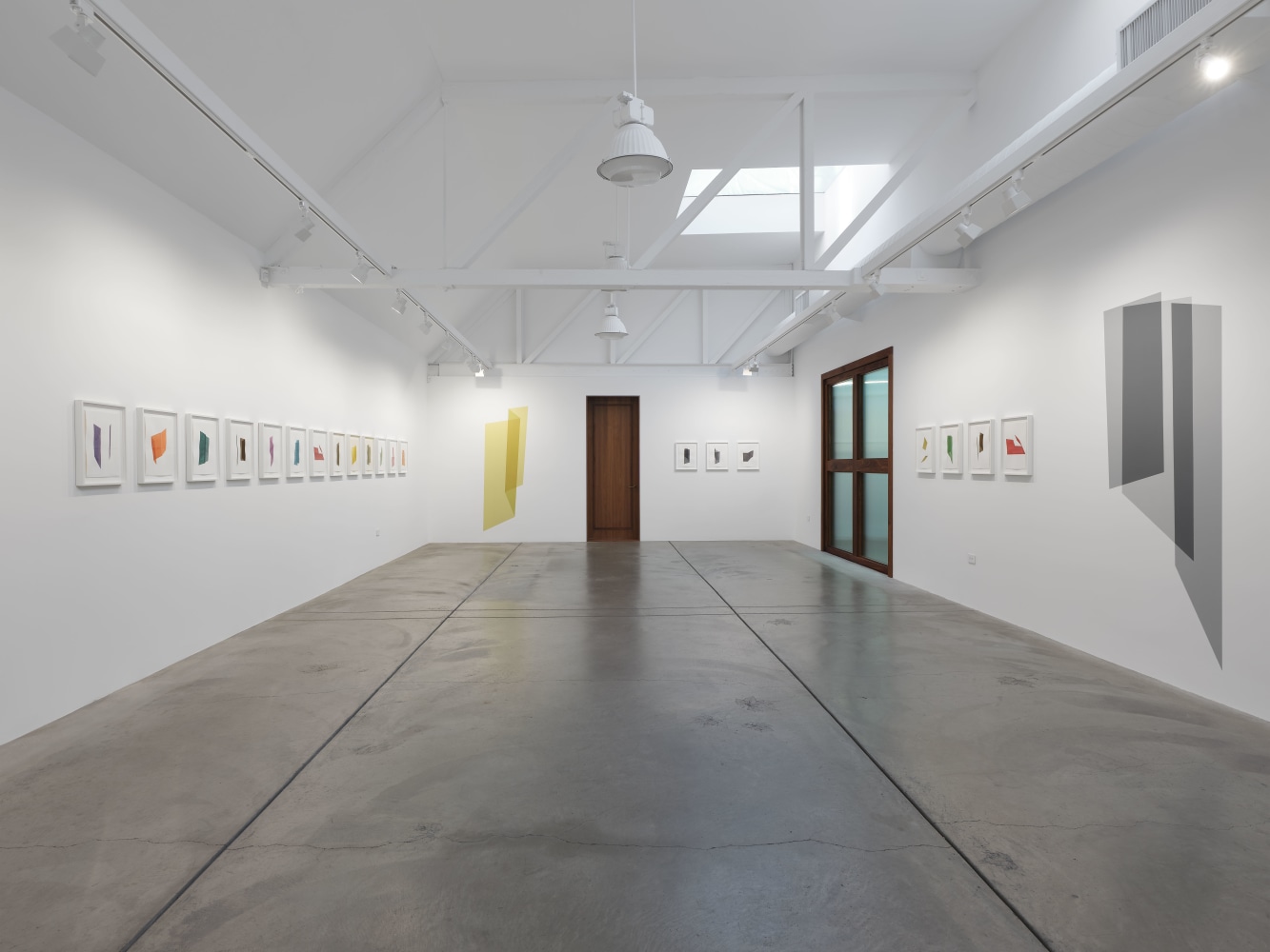 Kate Shepherd Wall painting 6, overlapping greys, sheer middle, 2023 Latex on wall, custom colors Dimensions variable Approximately 84 x 42 inches