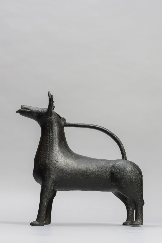 An Aquamanile in the form of a Stag, 12th century
Scandinavia or Lower Saxony
Bronze with a black patina, in excellent condition, missing only its sprue-hole cover; possibly some lost elements on the antlers and tail
9 5/8 x 3 5/8 x 9 1/8 inches
(24.5 x 9.3 x 23.2 cm)