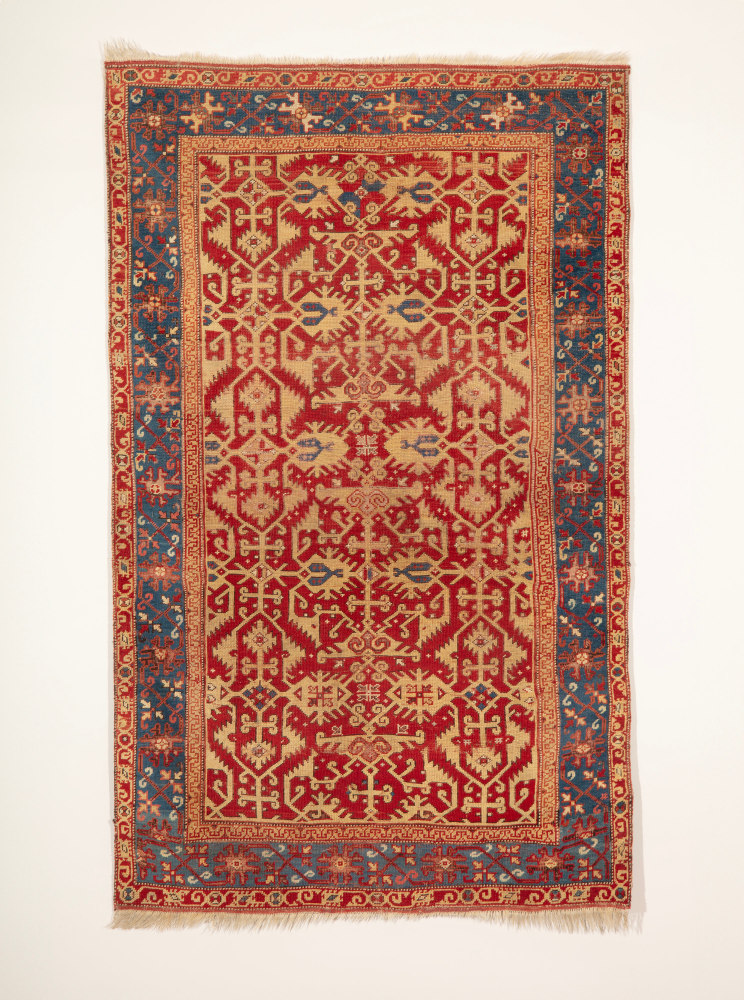 A complete &amp;#39;Lotto&amp;#39; Arabesque rug, c. 1500-1525
Western Anatolia
Warp, weft and pile of wool with a symmetrically knotted pile
78 3/8 x 47 5/8 inches
(199 x 121 cm)