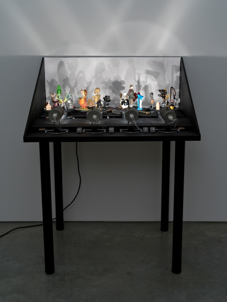 Hans-Peter Feldmann

Pocket Shadow Play

4 mechanical rotating discs on wood desk, lamps, various objects

52 1/2 x 40 1/2 x 32 inches (133 x 102.5 x 81.5 cm)

HPF 444

&amp;nbsp;

INQUIRE