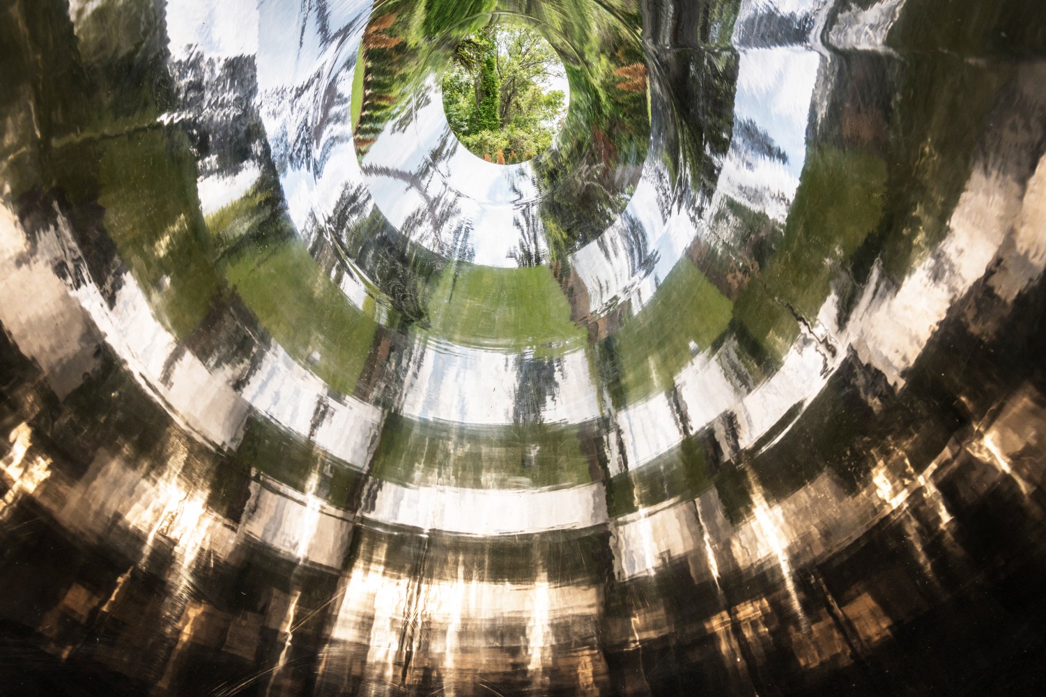 Alicja Kwade
TunnelTeller, 2018
Stainless steel, concrete, natural stone (Macauba azul)
Site specific installation for The Trustees&amp;rsquo; Castle Hill on the Crane Estate
Photo: Peter Vanderwarker Photography

&amp;nbsp;