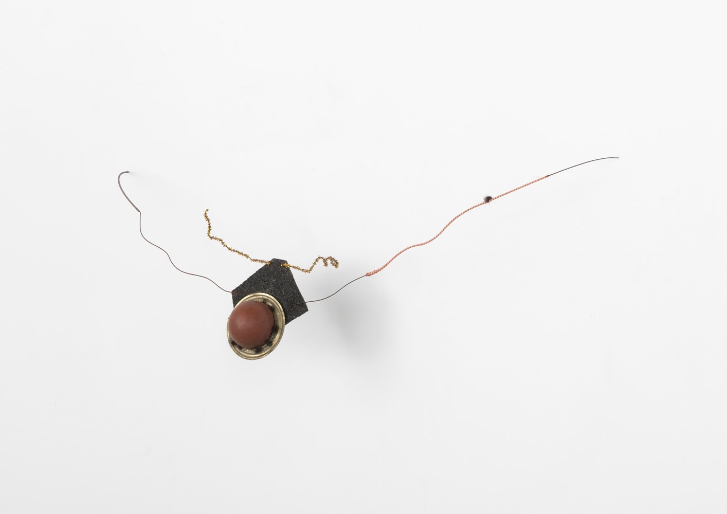 David Hammons
Untitled, 1976&amp;mdash;77
Wire, rope, pipe cleaner, hair, rubber, mesh,
aluminum, sand paper and thumb tack
10 &amp;times; 28 1/2 &amp;times; 6 inches
25.4 &amp;times; 72.4 &amp;times; 15.2 cm