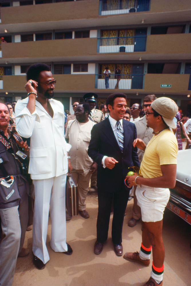 Roy Lewis (b. 1937)
Jeff Donaldson and AMB Andrew Young Talk with USA Participant in FESTAC Village, 1977
Archival inkjet print on Simply Elegant Gold Fibre paper
Image: 20 x 13 3/4 inches (50.8 x 34.9 cm) Sheet: 22 x 17 inches (55.9 x 43.2 cm)
Framed: 25 3/8 &amp;times; 18 5/8 &amp;times; 1 1/2 inches (64.5 &amp;times; 47.3 &amp;times; 3.8 cm)
Edition of 5, printed 2023