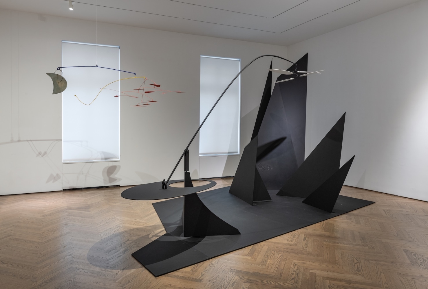 Horizontal Red Moon Gong,&amp;nbsp;1957 (left);&amp;nbsp;Clouds over Mountains,&amp;nbsp;1962 (right)
&amp;nbsp;

Installation view of&amp;nbsp;CALDER&amp;nbsp;at GRAY New York, 2024.&amp;nbsp;
&amp;copy; 2024 Calder Foundation, New York / Artists Rights Society (ARS), New York
&amp;nbsp;