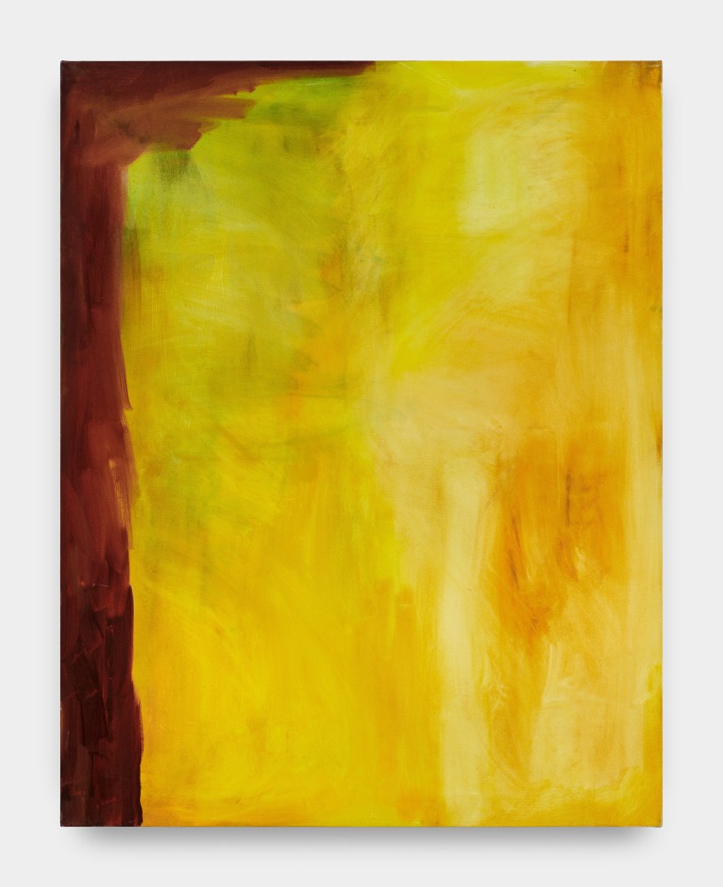 An abstract painting in golden yellow hues with a brown section of pigment along the side.