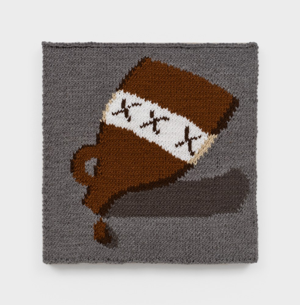 A knit artwork depicting an upside down brown liquor bottle spilling onto a grey background, sewn into linen and stretched.