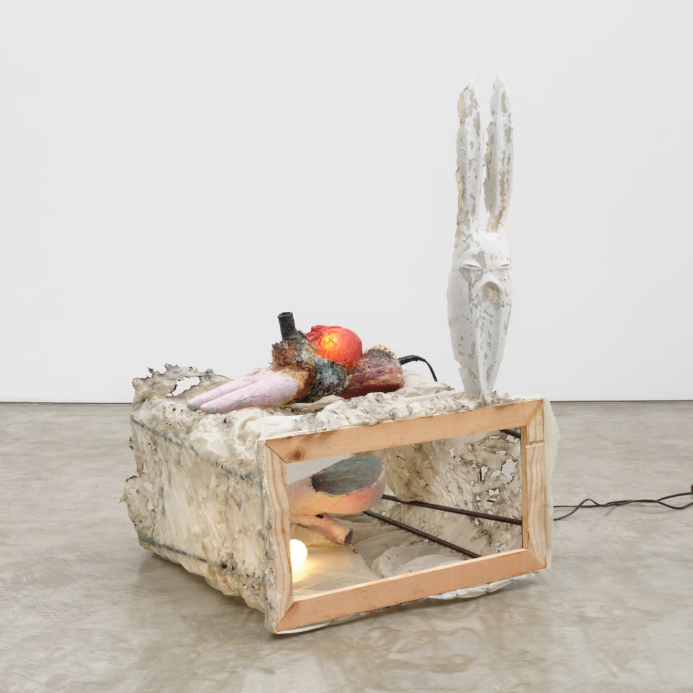 Happening, 2022 burned fabric, resin, steel, wood, angle grinder, beeswax, found textiles, epoxy clay, wire mesh, plaster, papier mache, light, horse hair, turtle shell 44 7/8 x 31 x 28 3/4 in (114 x 78.7 x 73 cm)