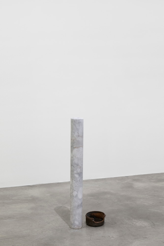 Tania Pérez Córdova (b. 1979) To wink, to cry, 2020 Marble, cooper cast, artificial tears, cosmetic contact lens, a person wearing one contact lens of a color different to her/ his eyes occasionally 32.01 x 4.88 x 4.88 inches 81.3 x 12.4 x 12.4 cm