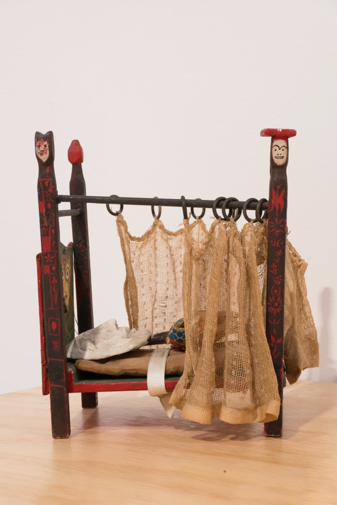 Leonora Carrington

Cama con mu&amp;ntilde;eca, 1948

Polychrome wood (red sgraffito covered with black paint), metal, silk, cotton, and beads

20 x 16 x 12 cm

7 3/4 x 6 1/4 x 4 3/4 in

Unique