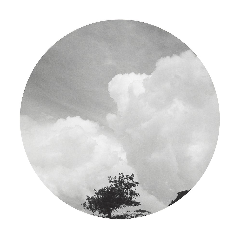 Morocco XXVI (Clouds and Tree)

Silver Gelatin Print

12&amp;quot; diameter (image) 1995