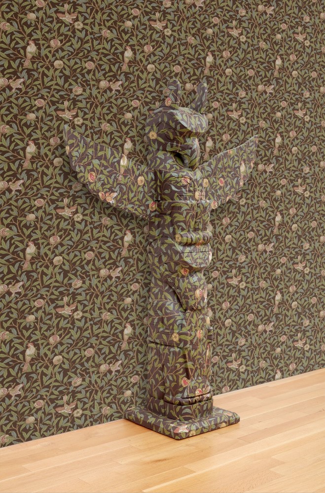 Nicholas Galanin

The Imaginary Indian (Orientalism, after E.W. Said), 2025

Indonesian replica of a Ling&amp;iacute;t totem with Victorian wallpaper

Installation dimensions variable
Totem: 79 1/2 x 51 1/2 x 19 1/4 inches (201.9 x 130.8 x 48.9 cm)

(NGA25-03)