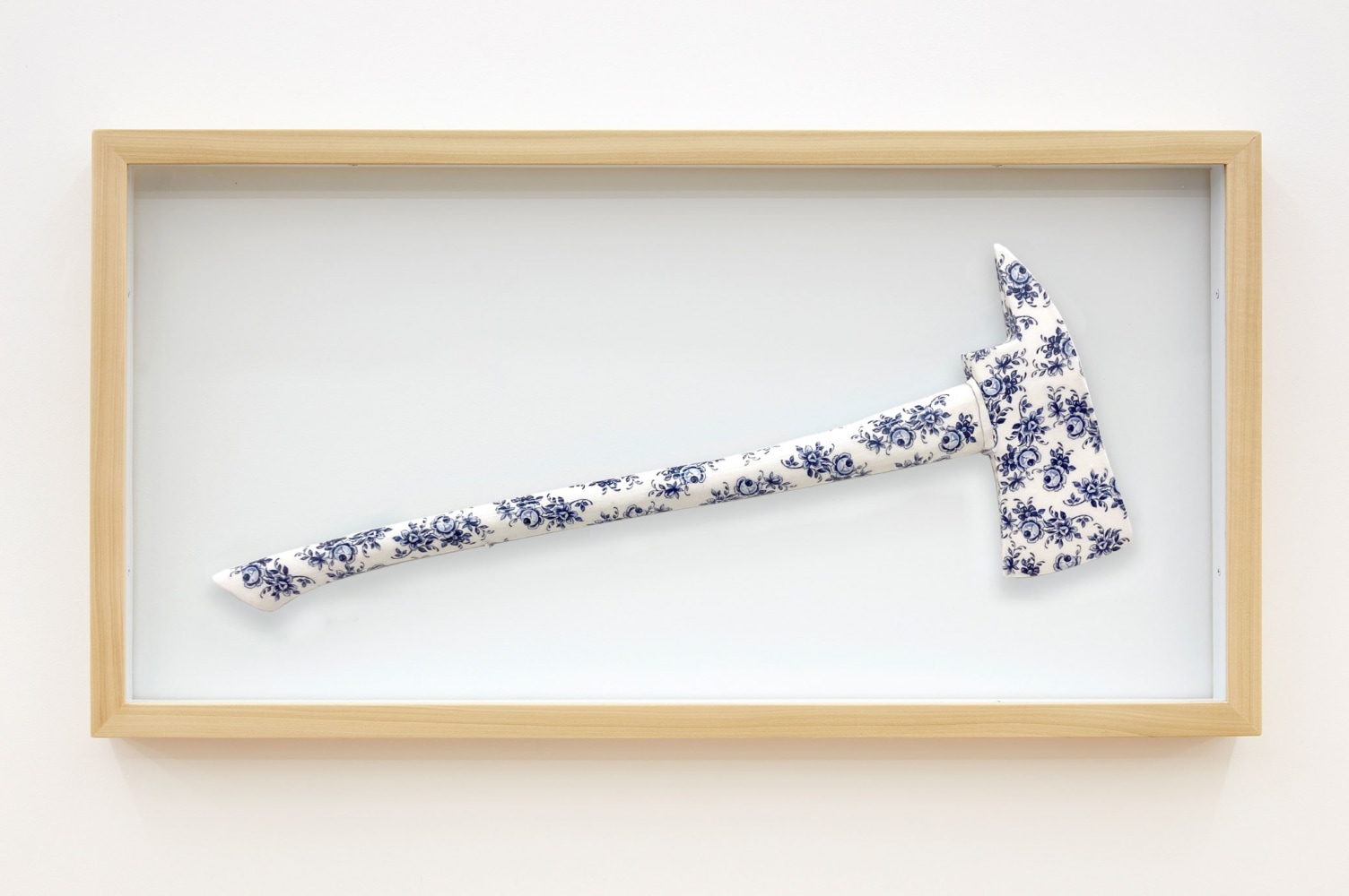 Nicholas Galanin&amp;nbsp;
Break in case of emergency, 2022&amp;nbsp;
porcelain and wooden box with glass&amp;nbsp;
wooden box with glass: 16 x 31 1/4 x 2 inches (40.6 x 79.4 x 5.1 cm) axe: 24 x 9 x 1 inches (61 x 22.9 x 2.5 cm)&amp;nbsp;
(NGA22-13)&amp;nbsp;
