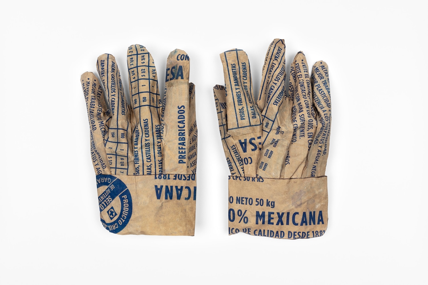 Dami&amp;aacute;n Ortega (1967), Working Skin, 2019, kraft paper and cement sack cuttouts, Two pieces 28 x 8 x 18 cm. (11.02 x 3.15 x 7.09 in.)