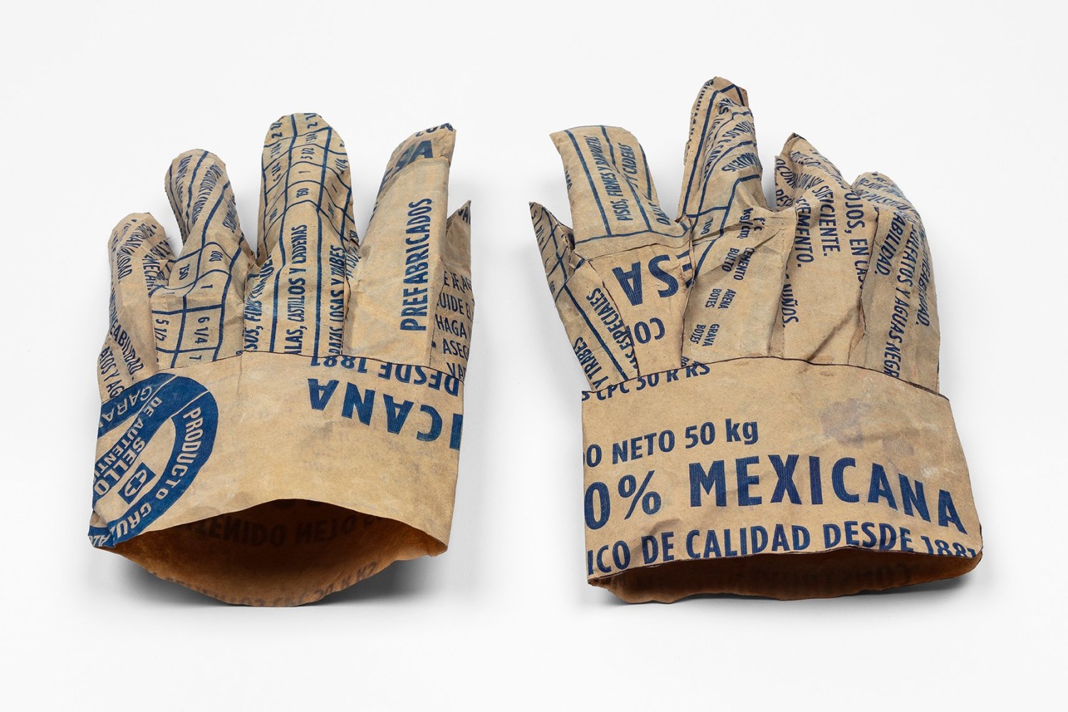 Dami&amp;aacute;n Ortega (1967), Working Skin, 2019, kraft paper and cement sack cuttouts, Two pieces 28 x 8 x 18 cm. (11.02 x 3.15 x 7.09 in.)