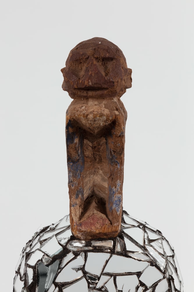 Kader Attia
Mirror Mask (detail)
2020
Wooden mask, mirror fragments, black pigment
Artwork Dimensions:
17 1/2 x 6 x 6 1/2 inches (44.5 x 15.2 x 16.5 cm)
Overall Dimensions:
75 1/4 x 10 x 10 inches (191.1 x 25.4 x 25.4 cm)