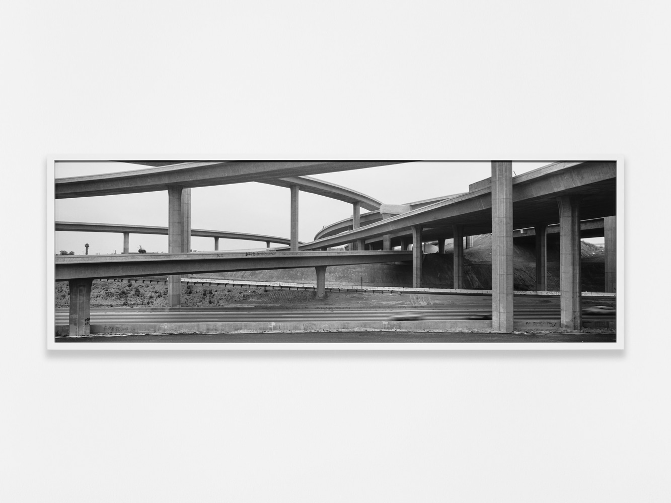 Catherine Opie
105 Freeway, 1994
1994/2024
Pigment print
28 1/4 x 83 1/4 x 2 inches (71.8 x 211.5 x 5.1 cm)