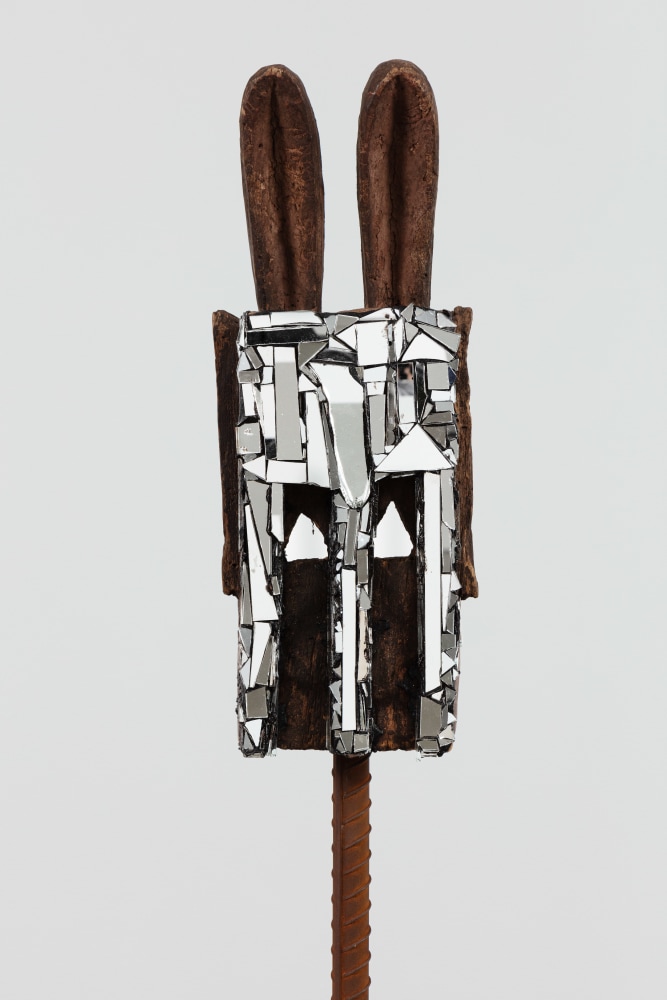 Kader Attia
Mirror Mask (detail)
2020
Wooden mask, mirror fragments, black pigment
Artwork Dimensions:
18 1/8 x 7 x 6 5/8 inches (46 x 18 x 17 cm)
Overall Dimensions:
77 x 10 x 10 inches (195.6 x 25.4 x 25.4 cm)