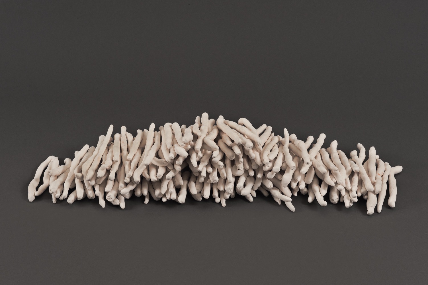 Joel Shapiro (b. 1941)
Untitled, 1972
Porcelain
202 units, approximately 1&amp;frasl;2 inch diameter x 5 inches, each
