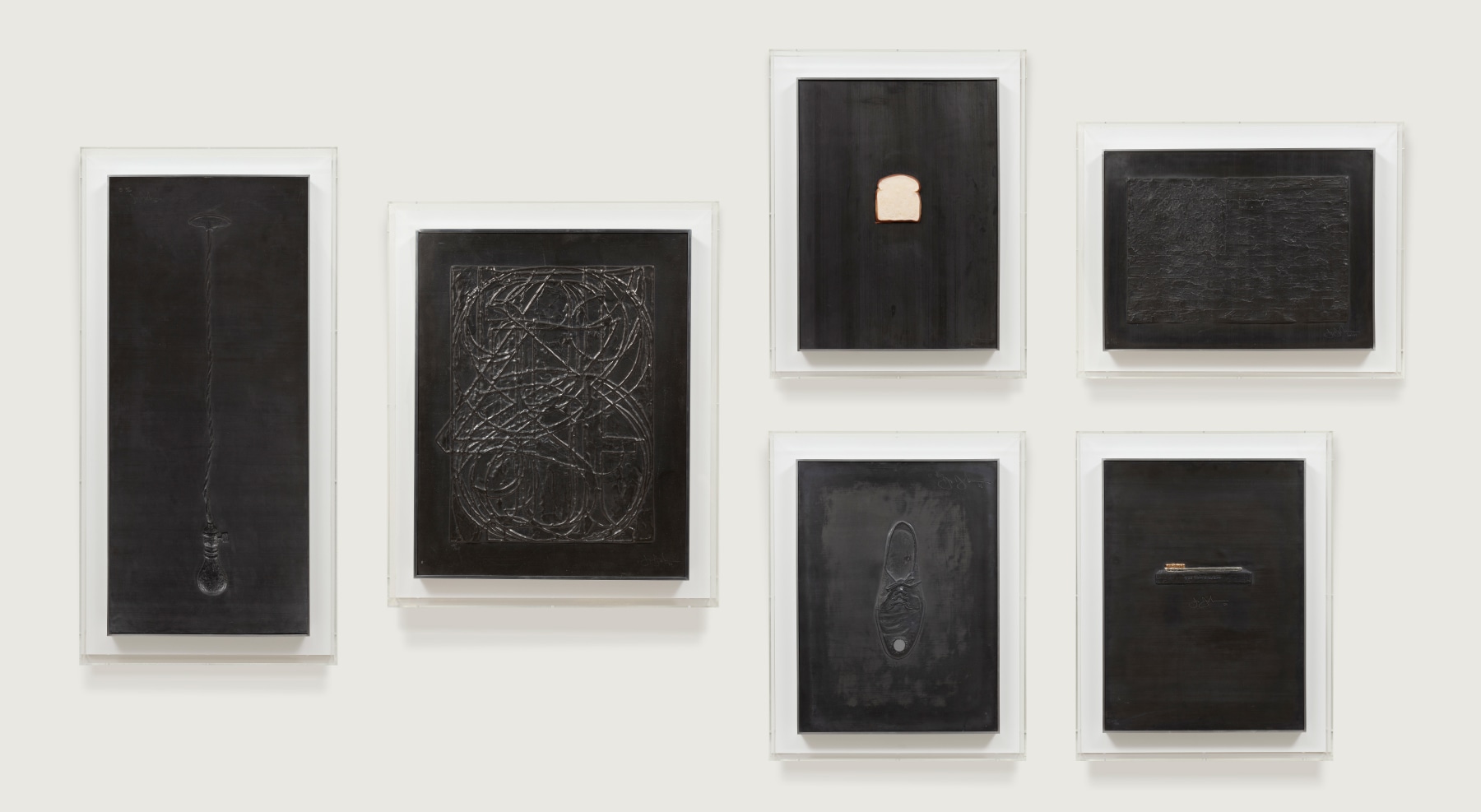 Jasper Johns

Lead Reliefs, 1969&amp;nbsp;
Six lead reliefs with some variations: embossed sheet lead with mirror (High School Days); with tin leaf and cast gold (The Critic Smiles); and with oil on paper hand-painted by the artist (Bread)&amp;nbsp;
39 x 17 inches, Light Bulb&amp;nbsp;

30 x 23 1/2 inches, 0 through 9&amp;nbsp;

23 x 17 inches, Bread&amp;nbsp;

23 x 17 inches, High School Days&amp;nbsp;

17 x 23 inches, Flag&amp;nbsp;
23 x 17 inches, The Critic Smiles&amp;nbsp;
Edition of 60&amp;nbsp;

ULAE 72-6, 84; Gemini 129-33, 189; Field 118-22, 129