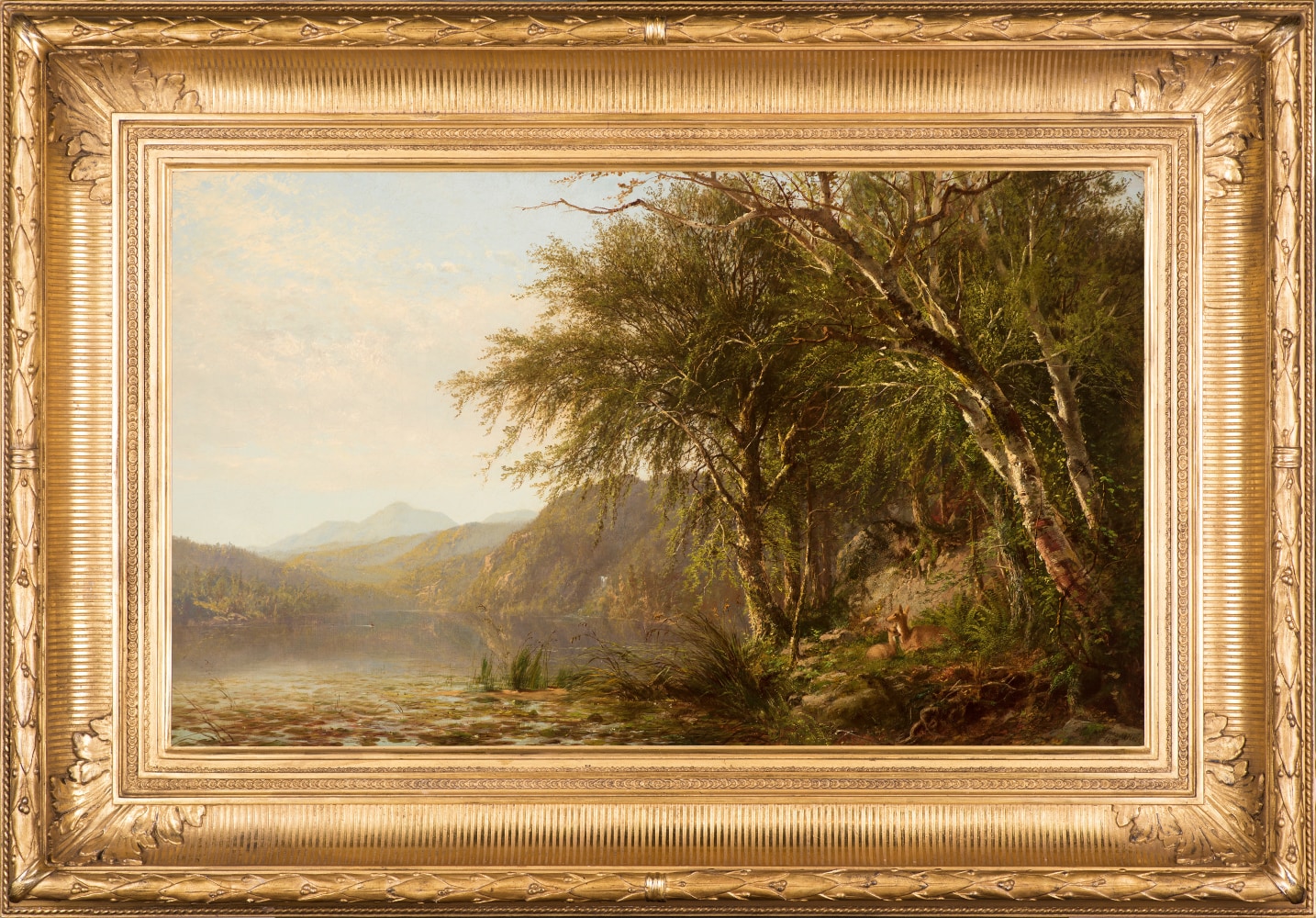 James M. Hart (1828–1901), View of Lake Placid, 1862, oil on canvas, 17 1/2 x 30 in., signed and dated lower right: James M. Hart / 1862, inscribed on verso: View on Placid Lake. / Essex Co. N. Y. / Painted by James M. Hart / 1862 (framed)