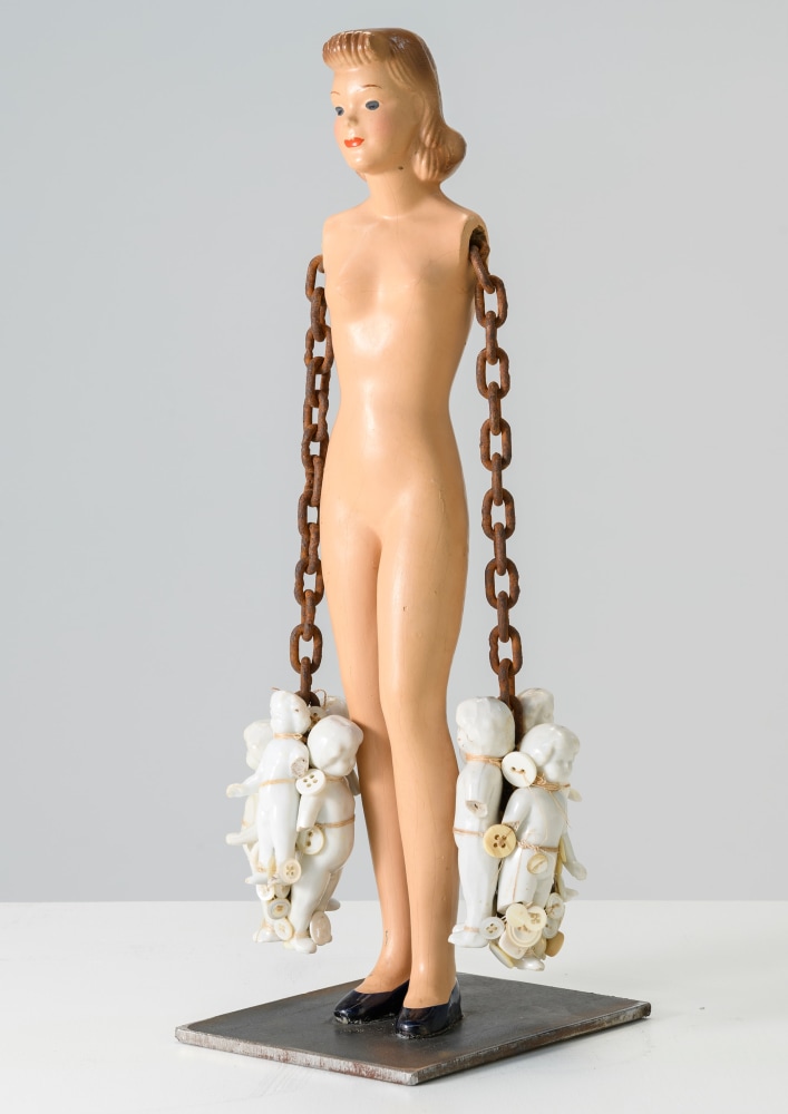 Karin Broker  Model girl, 2022 McCall Peggy, chain, ceramic dolls, thread, steel shelf 13 x 5 x 4 inches (KB-266)     $12,000