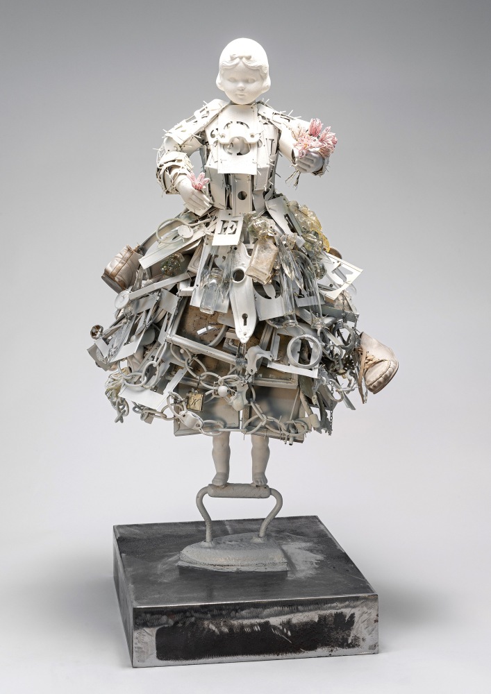 Karin Broker  Always Sorry Girl, 2020 porcelain, SAD iron, beads, paint, miscellaneous items, wire, steel base 28 1/2 x 15 x 14 inches  $25,000