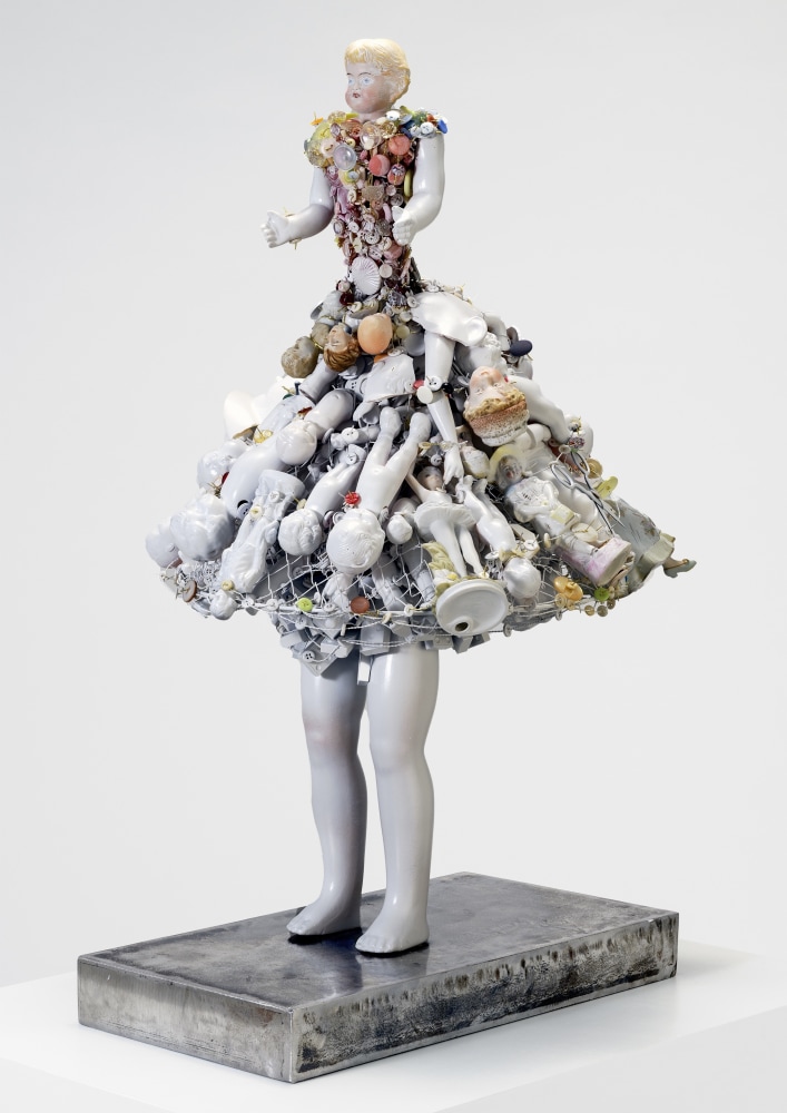Karin Broker  Anonymous girl, 2022  porcelain, ceramics, buttons, wire, misc. metals, steel base  29 x 17 x 19 inches