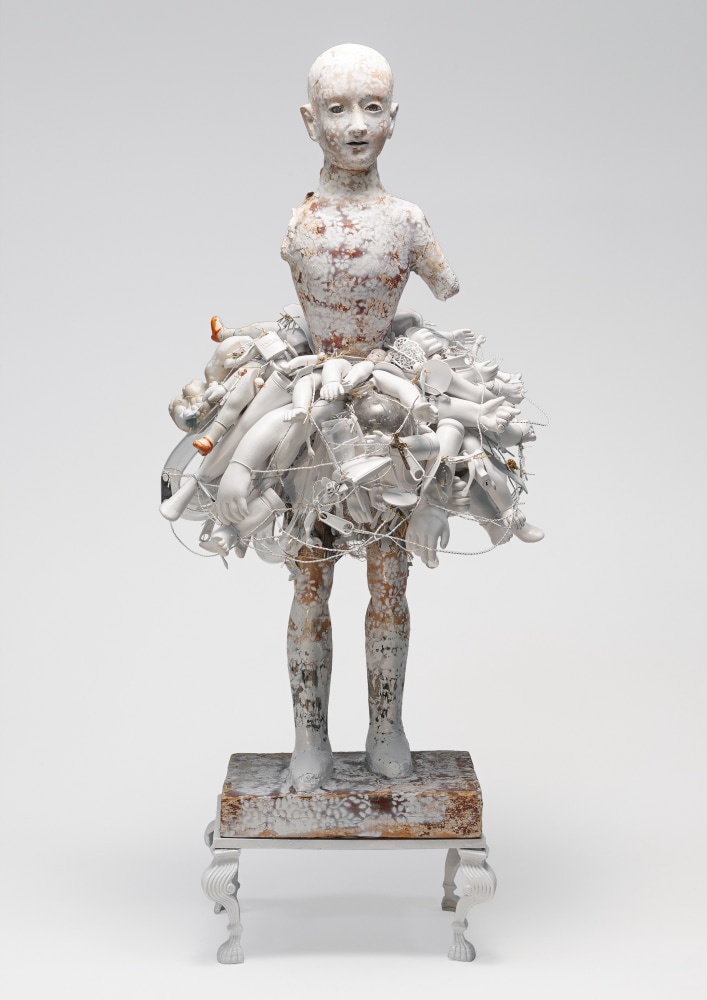 Karin Broker  Untitled, 2020  18th c. figure, paint, glass, ceramics, metal base, buttons, wire  29 1/2 x 13 x 12 inches painted wood pedestal: 43 1/2 x 11 1/2 x 11 1/2 inches  $25,000