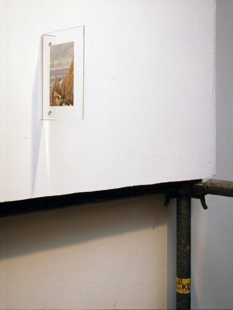 seconds after the dive, 2005

scaffolding and framed postcard&amp;nbsp;at the end of the trail

scaffolding: variable dimensions

&amp;nbsp;

&amp;nbsp;