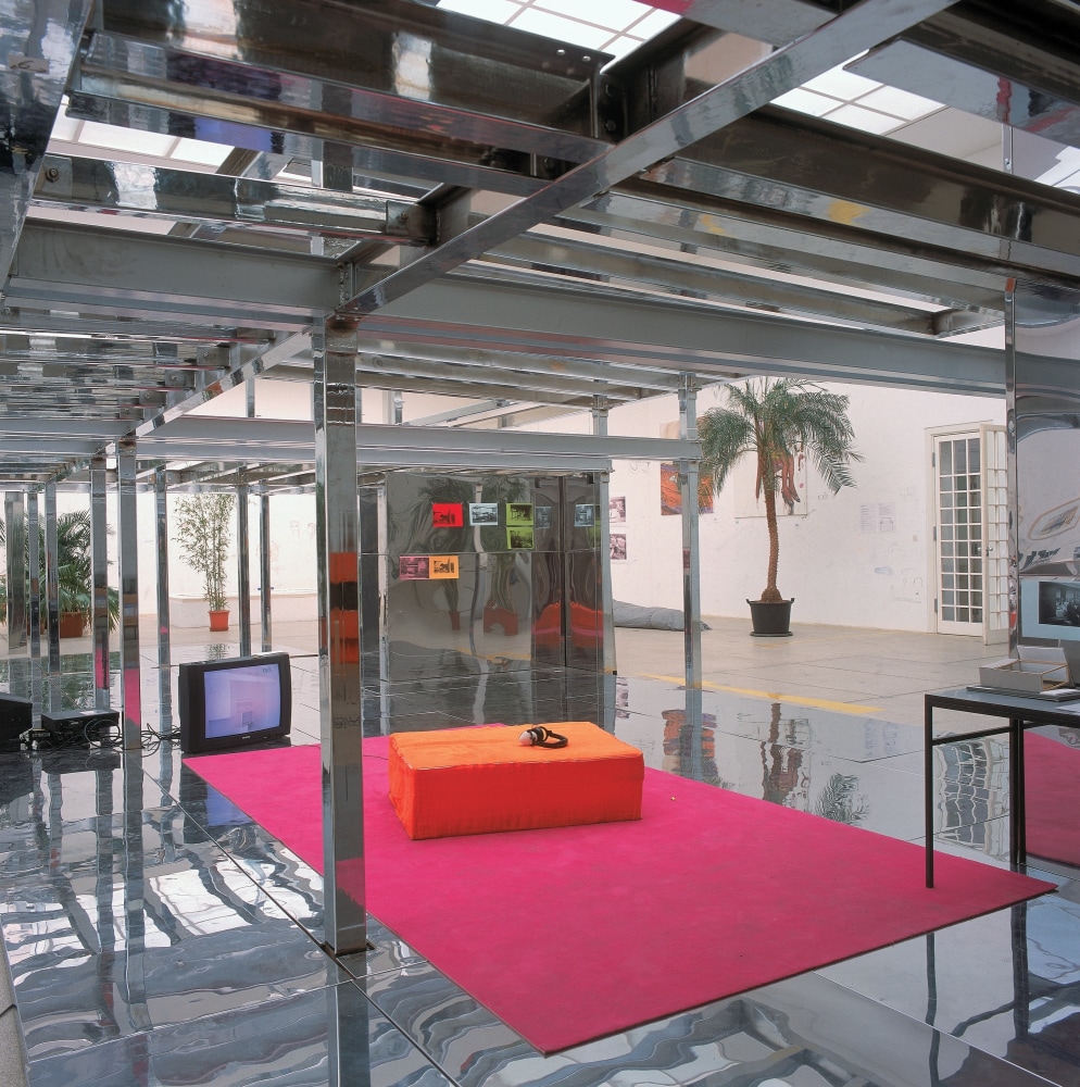 untitled 2002 (he promised), 2002
chrome and stainless steel, monitors, palms
variable dimensions

&amp;nbsp;