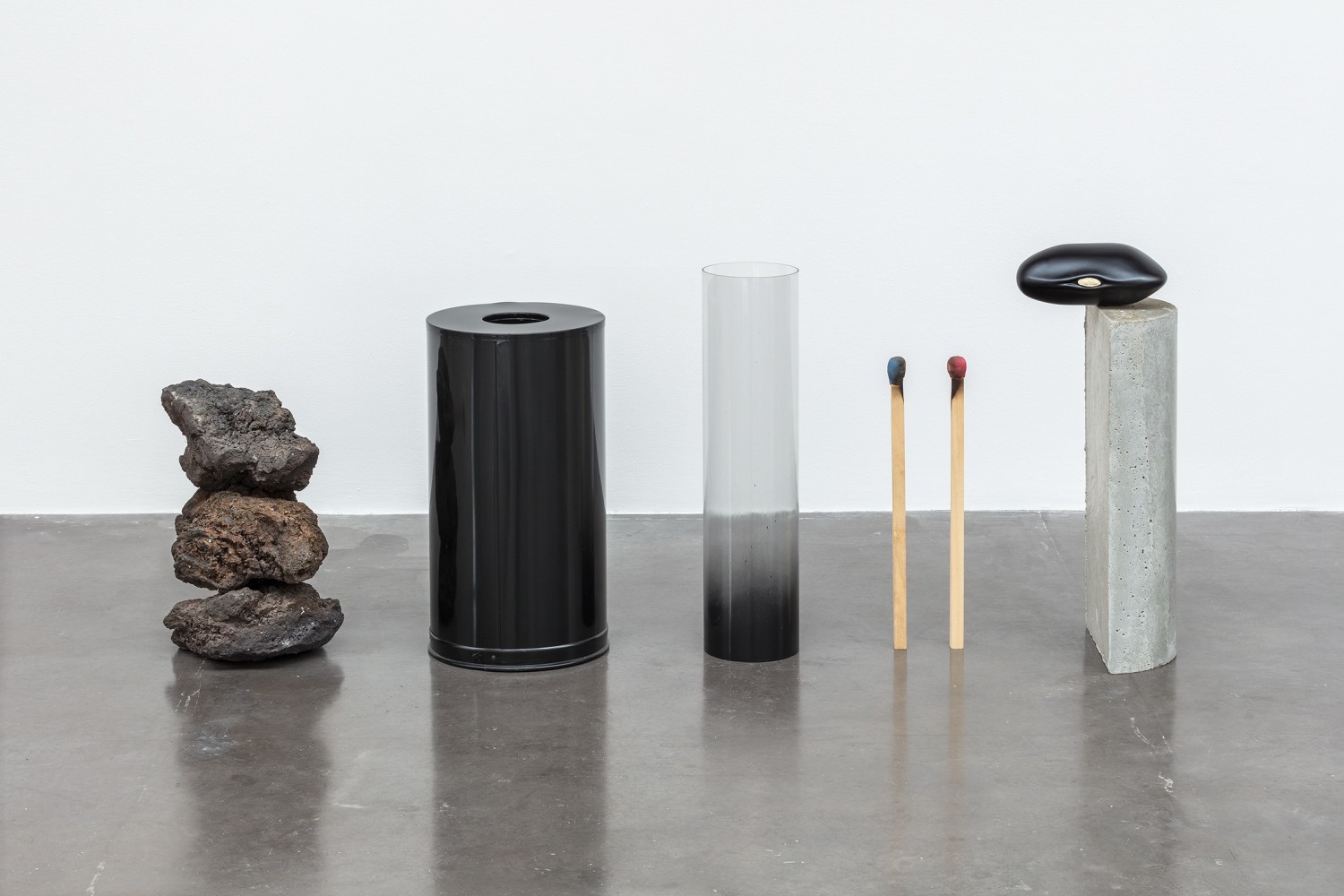 Left of center and right of center alternatives, top to bottom and bottom to top, 2014
Volcanic rock, metallic bin, spray painted acrylic, mixed media and wood, painted fiberglass and resin, concrete
100 x 187 x 50 cm