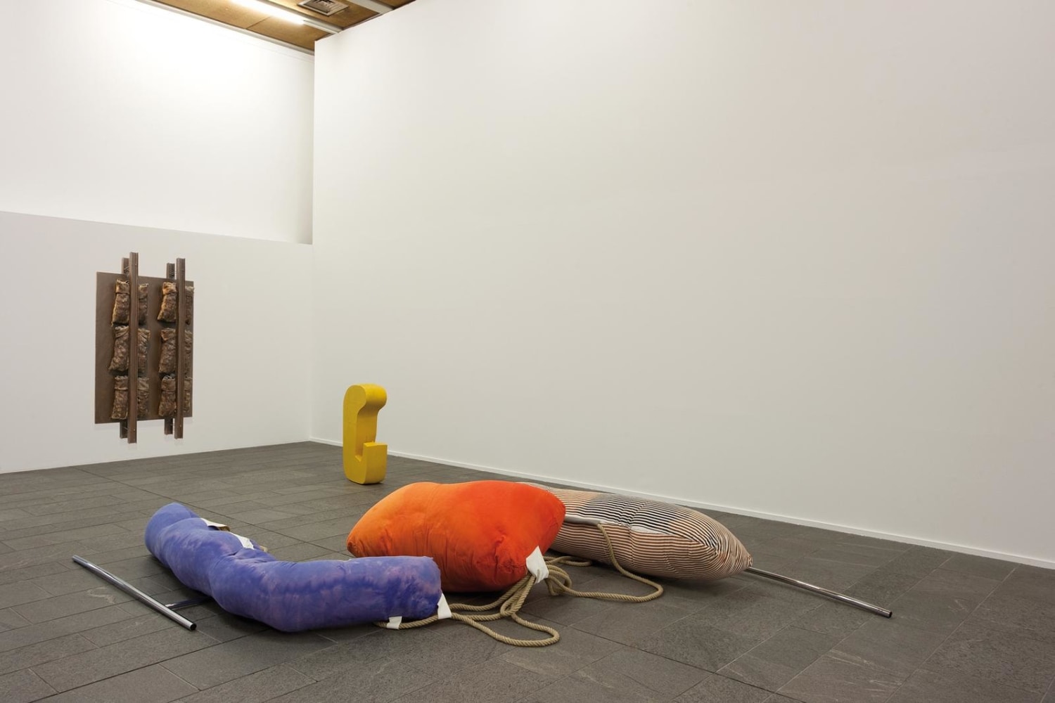 fluffing the pillows I (moorings, gurneys, silos), 2012

casted painted aluminium, fabric, rubber, pleather, hemp rope, chromed pole
variable&amp;nbsp;dimensions&amp;nbsp;

&amp;nbsp;

&amp;nbsp;